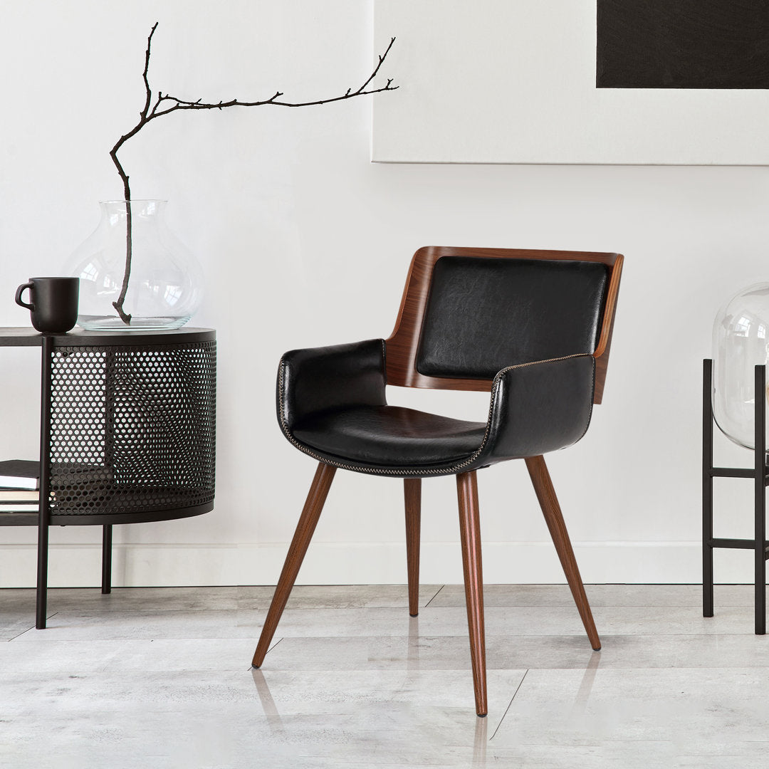 Seagraves Faux Leather Mid-Century Dining Chair Mercury Row® Upholstery Color: Polished Obsidian Faux Leather