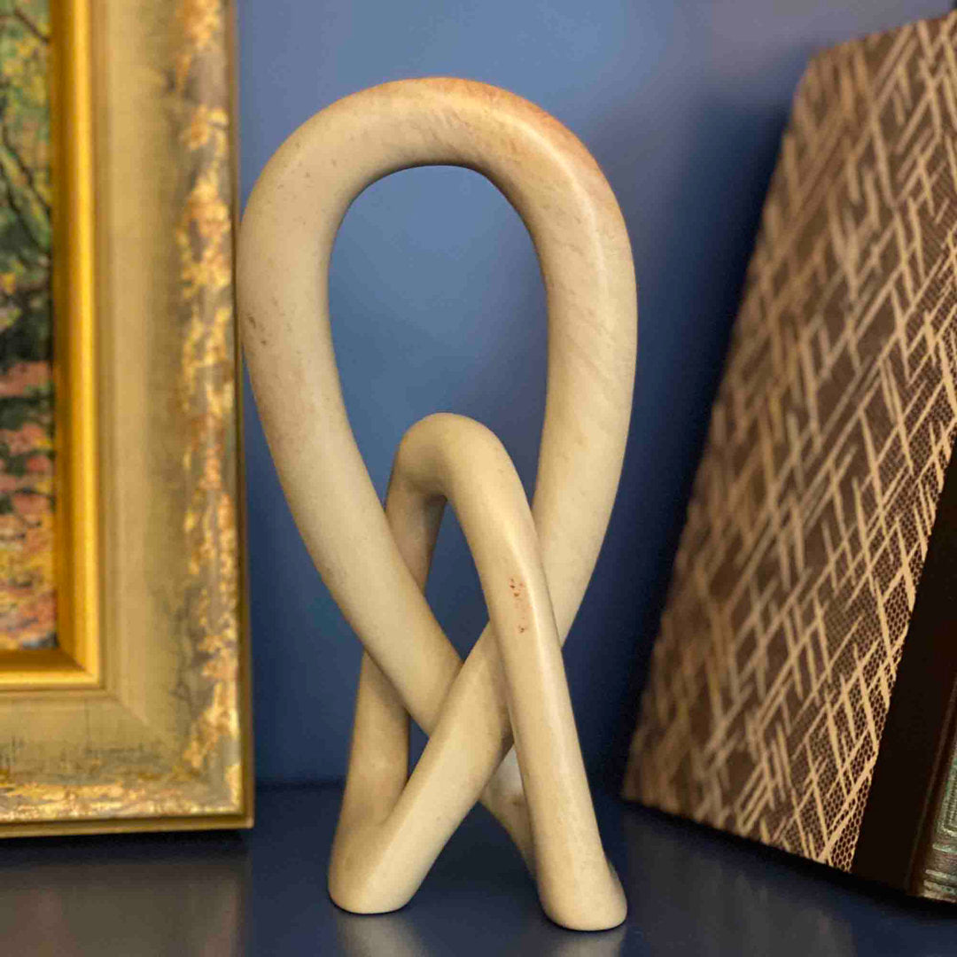 Jeffords Natural Soapstone Lovers Knot Sculpture Ivy Bronx Size: 8" H x 4" W x 3" D Finish: Natural