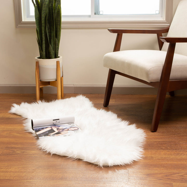 Diller White Faux Sheepskin Fur Machine Washable Shag Fluffy Area Rug Willa Arlo™ Interiors Rug Size: Novelty 2' x 4'