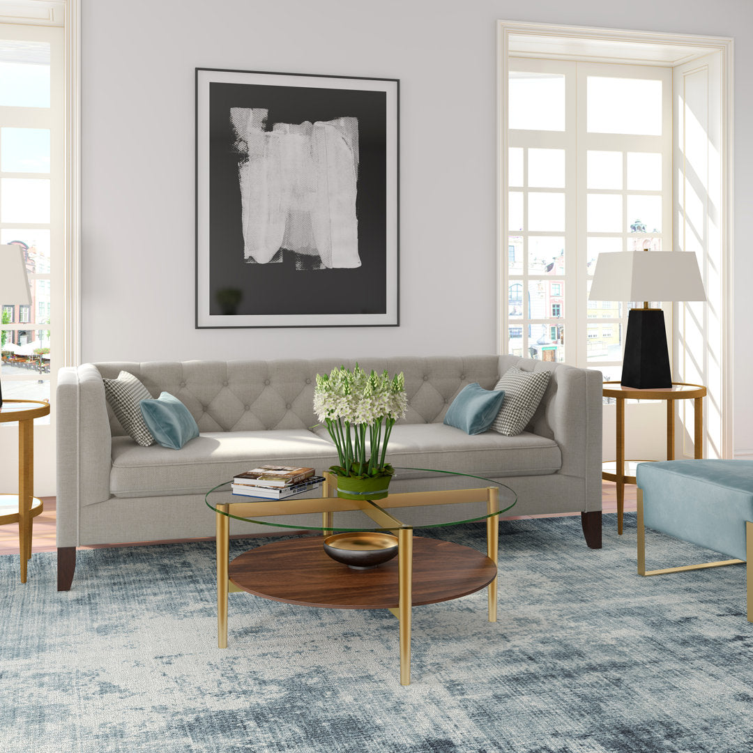 Otto 4 Legs Coffee Table with Storage Wade Logan® Table Base Color: Brown