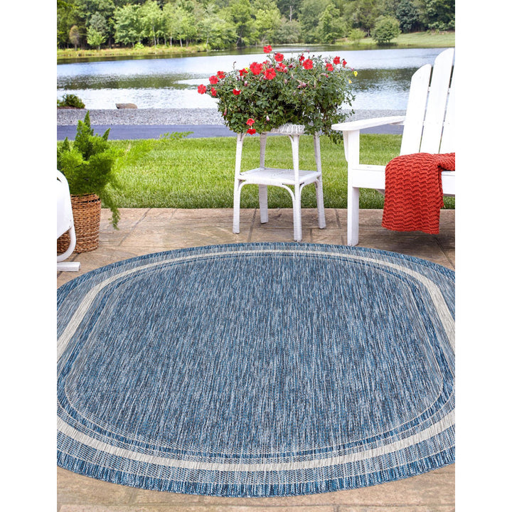 Swanee Blue Indoor / Outdoor Area Rug Arlmont & Co. Rug Size: Oval 7'10" x 10'