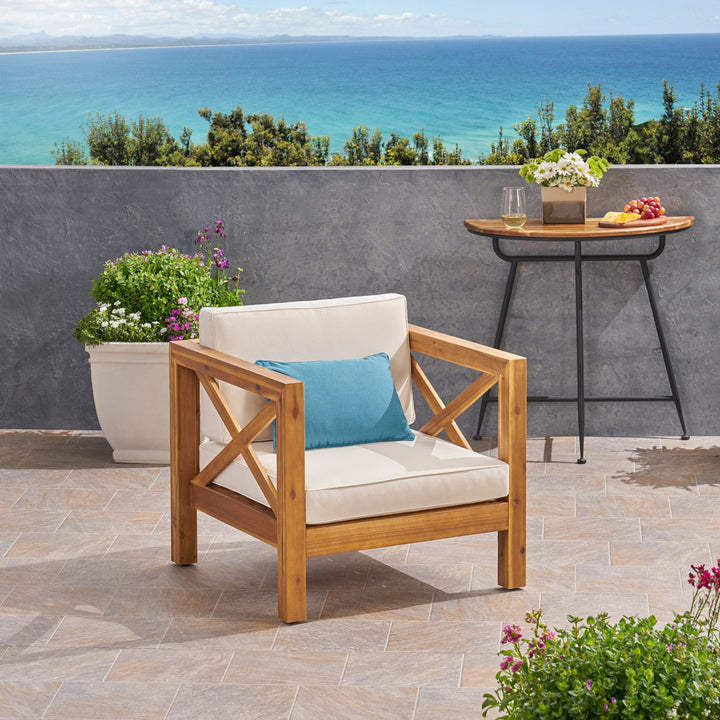 Teak Patio Chair with Cushions Highland Dunes Frame Color / Cushion Color: Teak Frame / Beige Cushion