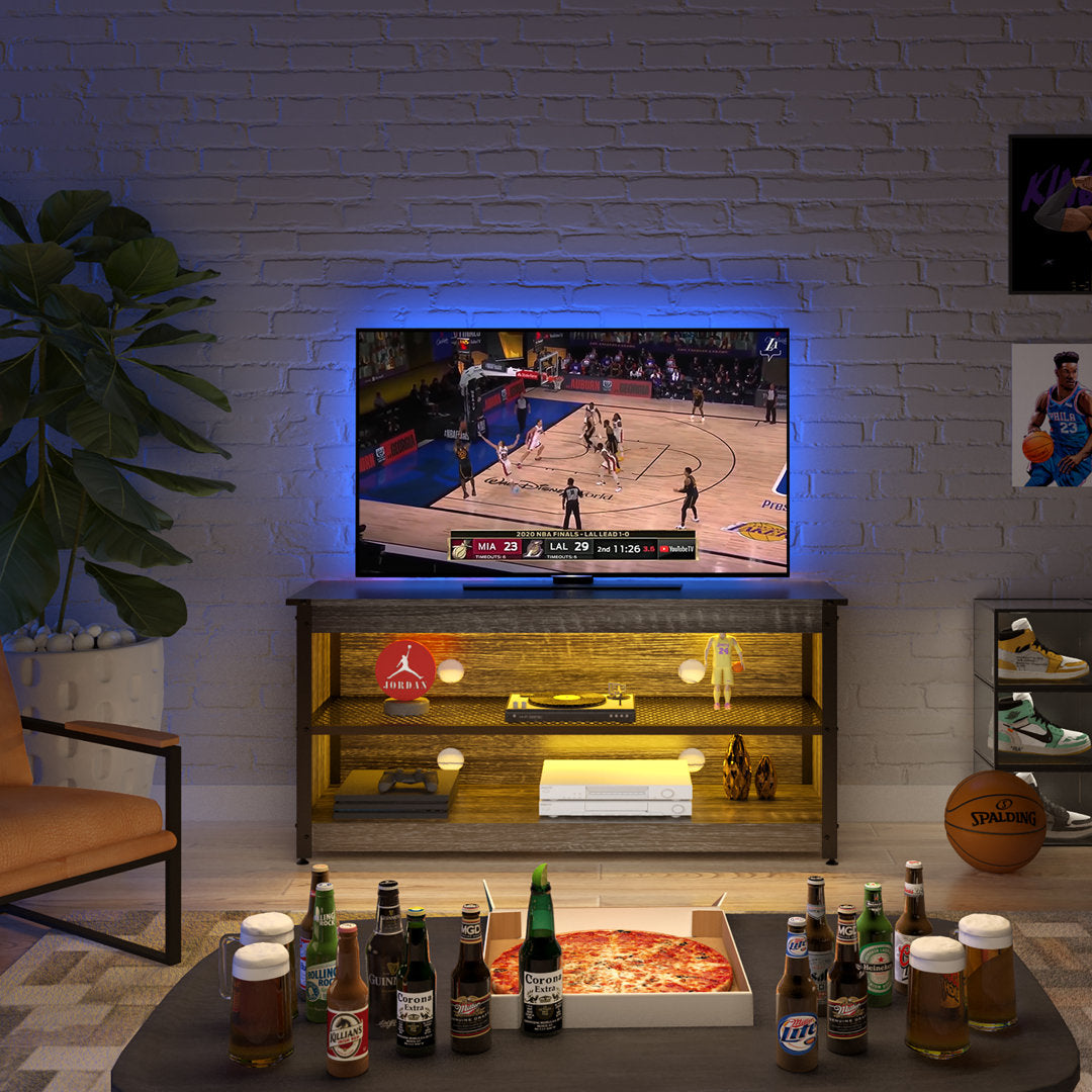 Antenore TV Stand for TVs up to 65" Zipcode Design™ Color: Brown/Black Overall Entertainment Center Width - Side to Side: 44.09