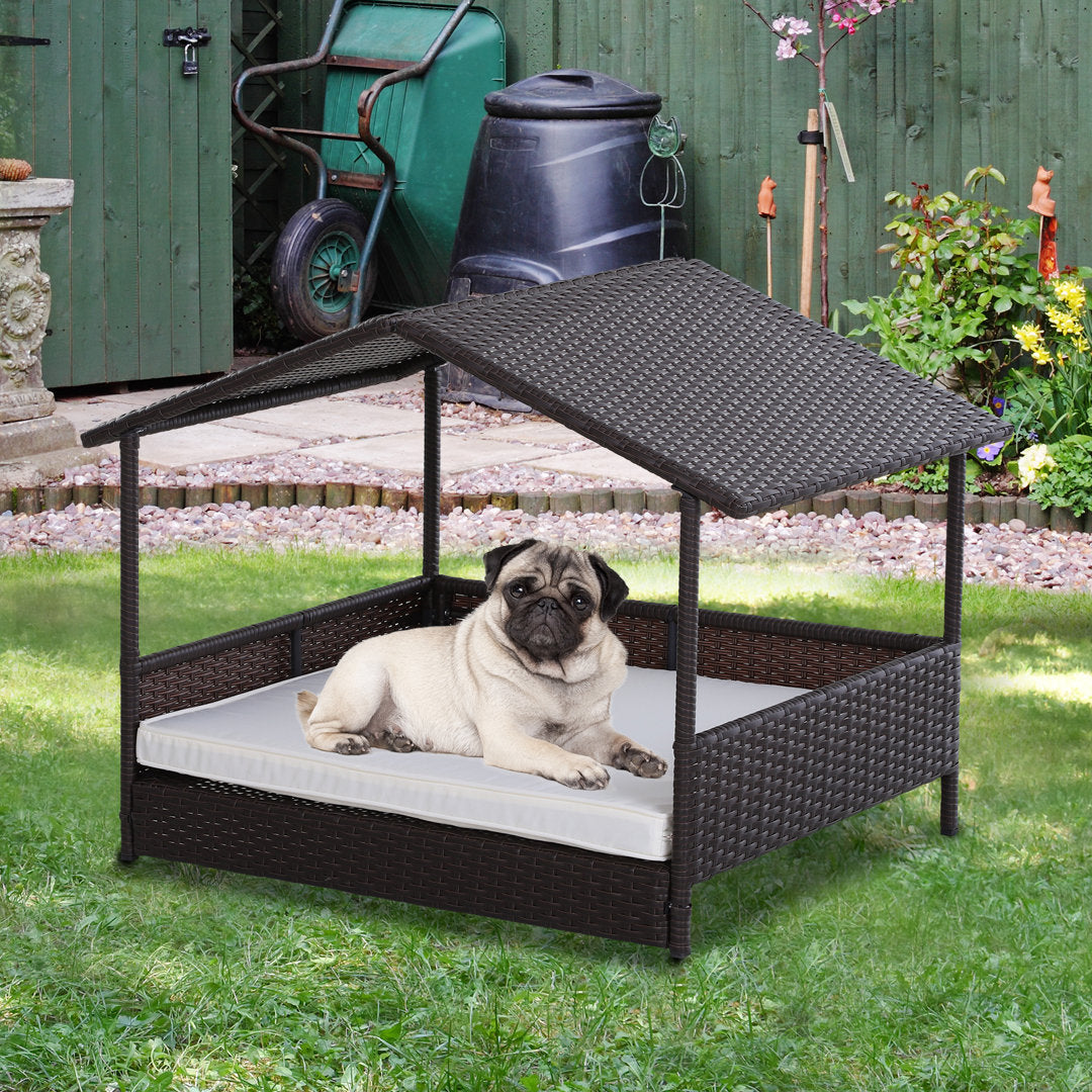 Lininger Wicker Dog House Three Posts™ Size: 27.5" H x 37.5" W x 27.25" D Finish: Brown