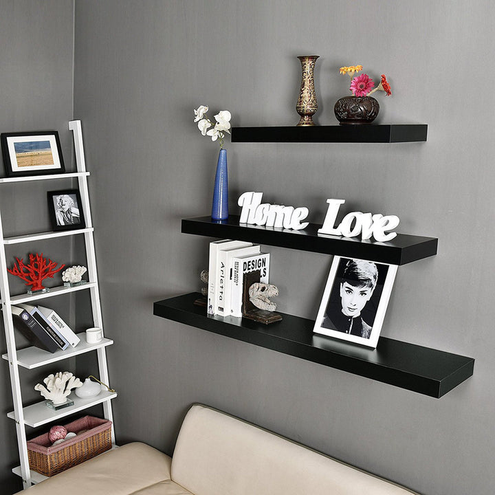Himmelmann Floating Shelf Ebern Designs Size: 1.25" H x 36" W x 7.25" D Finish: Black