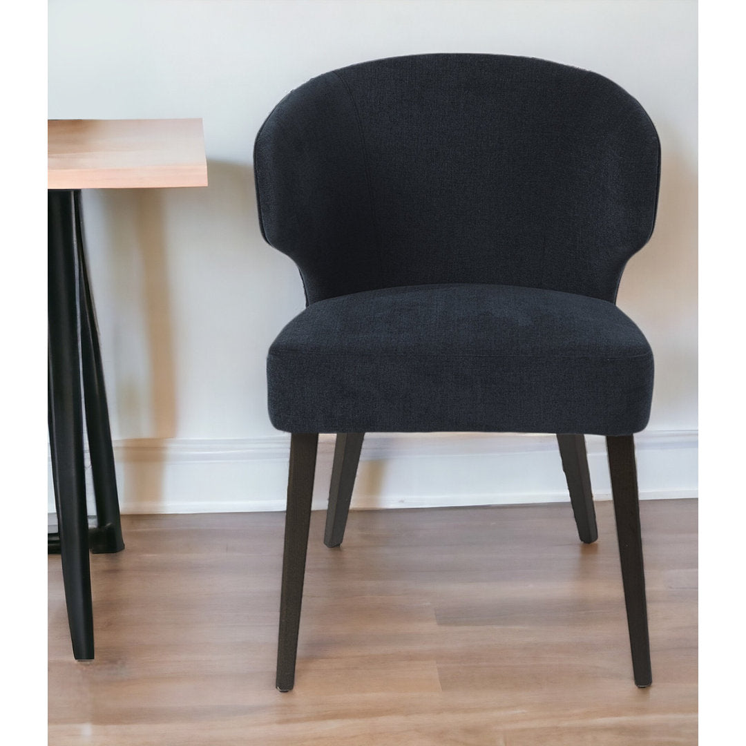 Golino Fabric Upholstered Wingback Side Chair Joss & Main Upholstery Color: Black, Leg Color: Black