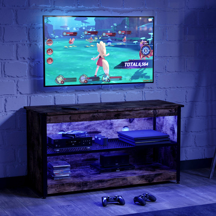 Antenore TV Stand for TVs up to 65" Zipcode Design™ Color: Brown/Black Overall Entertainment Center Width - Side to Side: 44.09