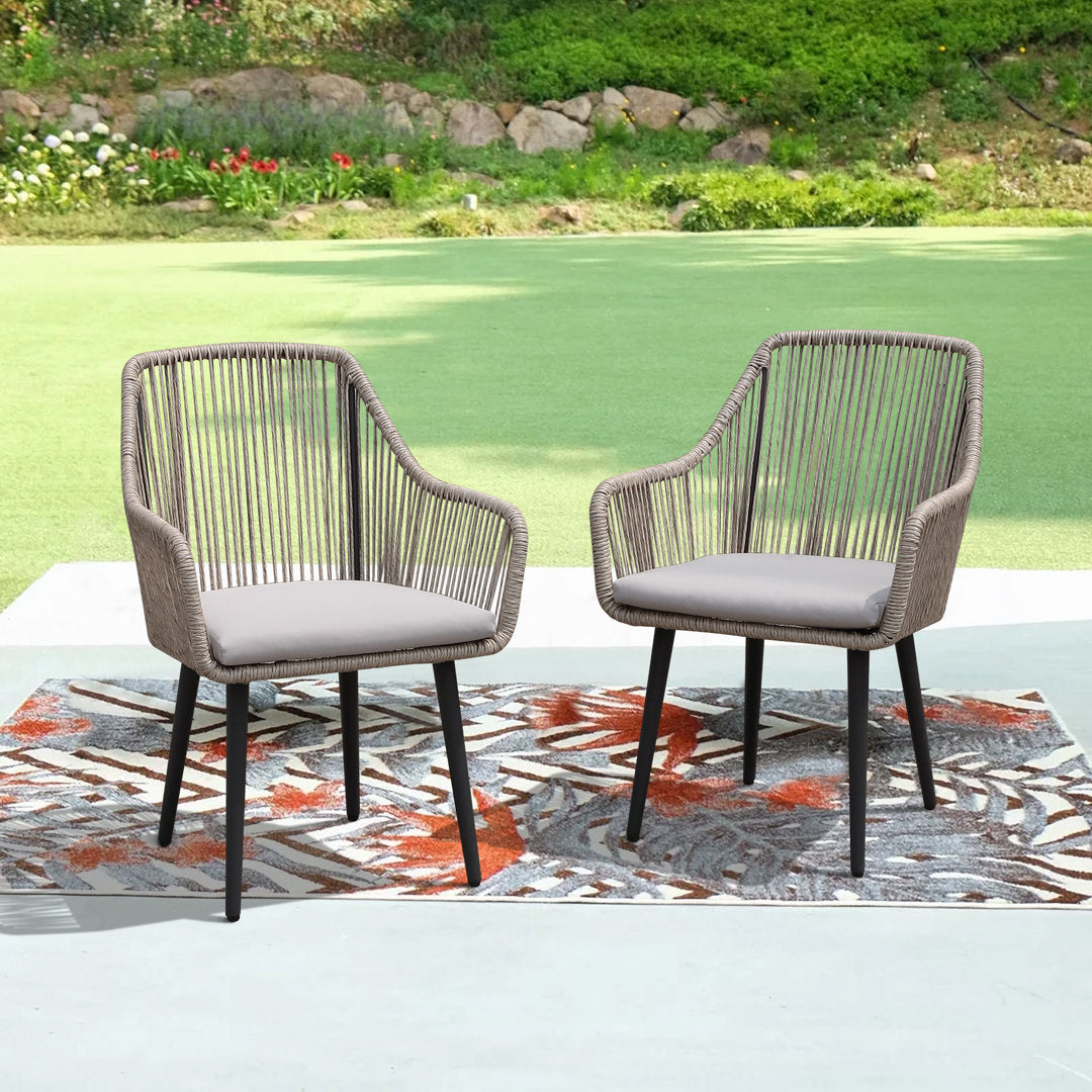 Cassil Patio Dining Armchair with Cushion (Set of 2) Wade Logan® Frame Color/Cushion Color: Beige Frame/Light Gray Cushion