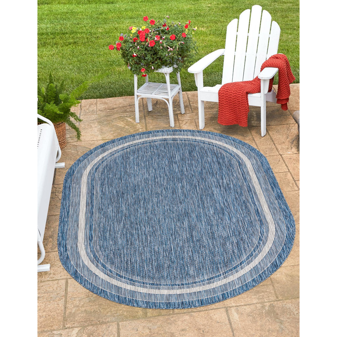 Swanee Blue Indoor / Outdoor Area Rug Arlmont & Co. Rug Size: Oval 7'10" x 10'