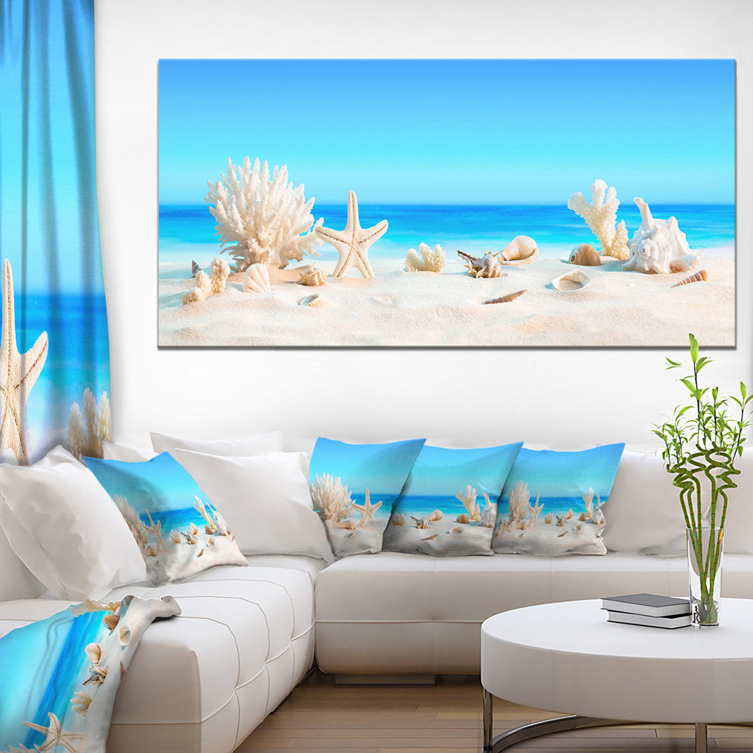 Risa Seashells on Tropical Beach' Graphic Art Highland Dunes Size: 28" H x 60" W x 1.5" D Format: Wrapped Canvas