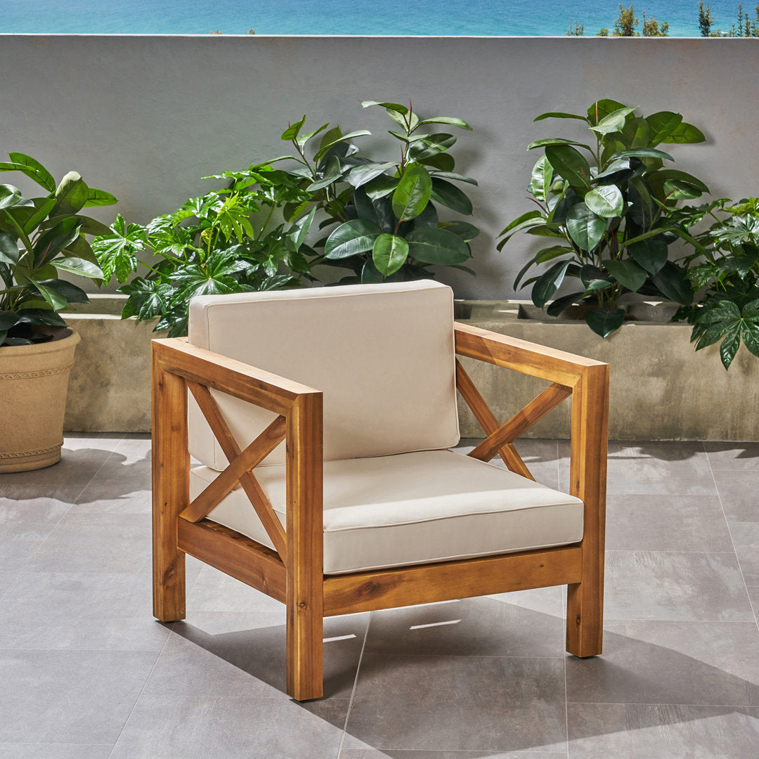 Teak Patio Chair with Cushions Highland Dunes Frame Color / Cushion Color: Teak Frame / Beige Cushion