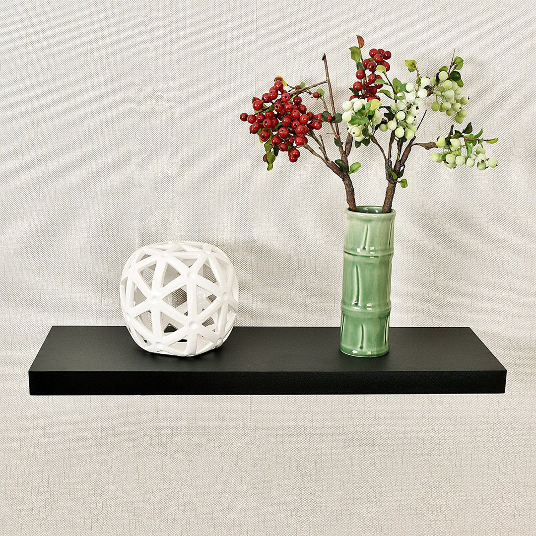 Himmelmann Floating Shelf Ebern Designs Size: 1.25" H x 36" W x 7.25" D Finish: Black