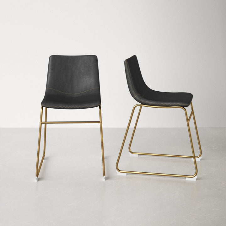 Nia Vegan Leather Side Chair (Set of 2) AllModern Frame Color: Gold, Upholstery Color: Black