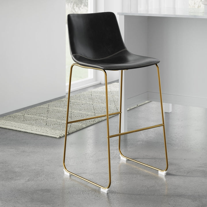 Nia Vegan Leather Bar & Counter Stool (Set of 2) AllModern Frame Color: Gold Upholstery: Black Vegan Leather, Seat Height: Bar Stool (29" Seat Height)