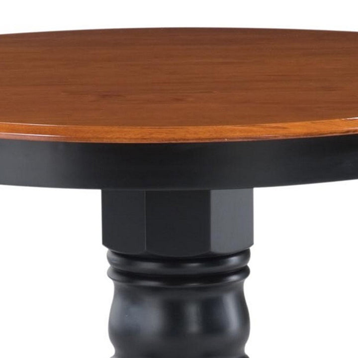 Standridge 42'' Solid Wood Pedestal Dining Table August Grove® Color: Black / Oak
