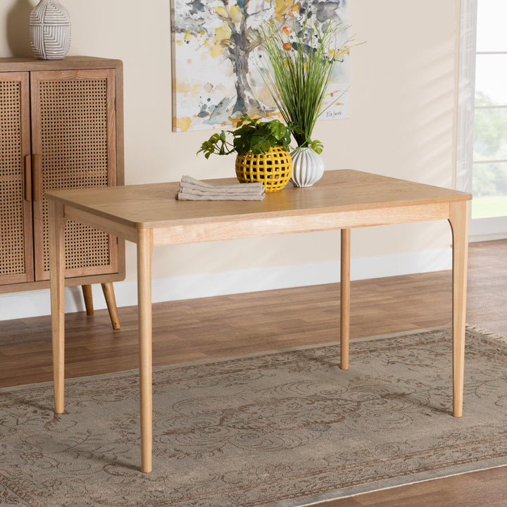 Kylani Dining Table Ebern Designs Color: Natural Oak