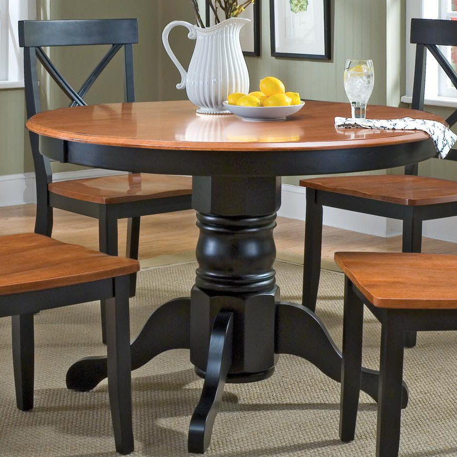 Standridge 42'' Solid Wood Pedestal Dining Table August Grove® Color: Black / Oak