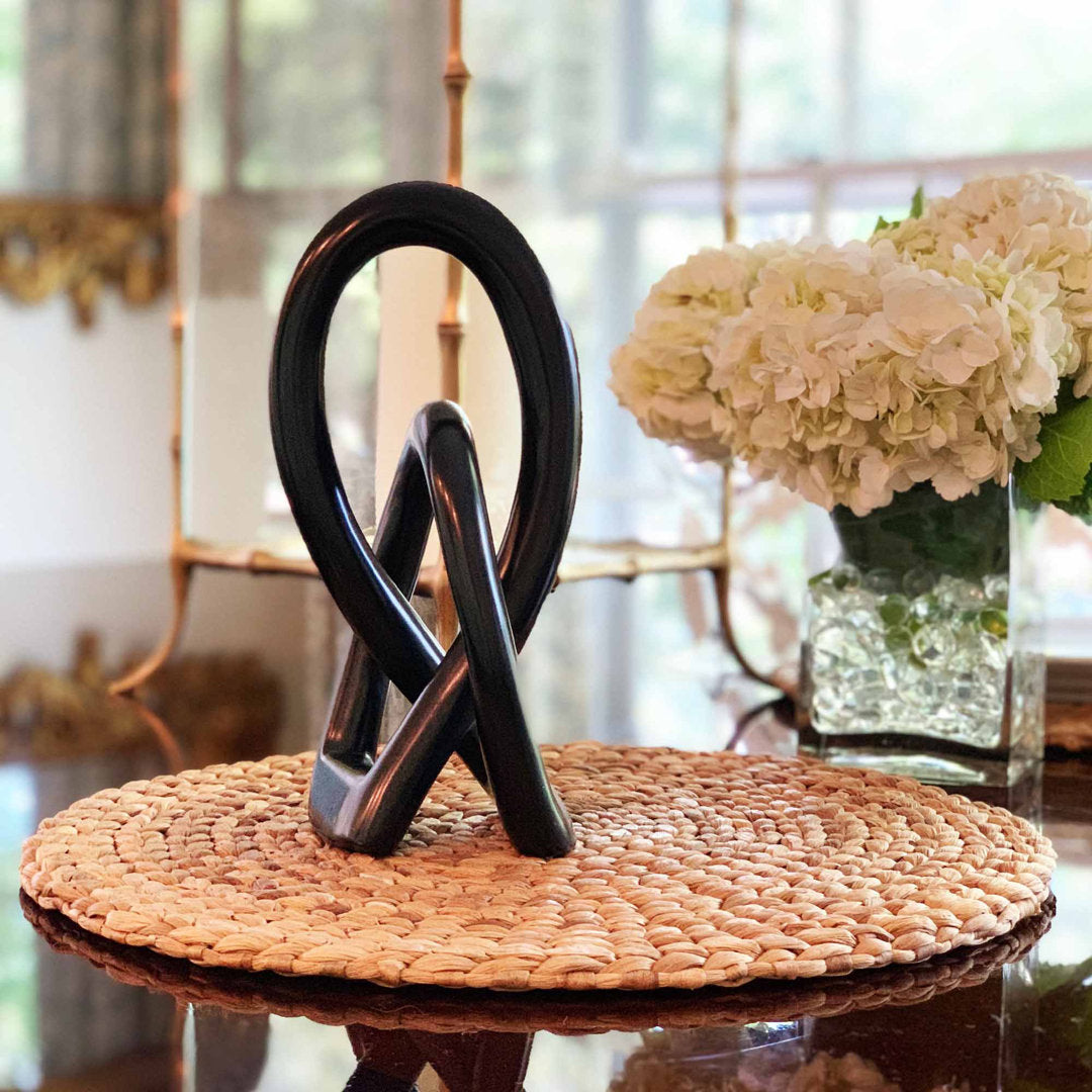 Jeffords Natural Soapstone Lovers Knot Sculpture Ivy Bronx Size: 6" H x 2.5" W x 2" D Finish: Black
