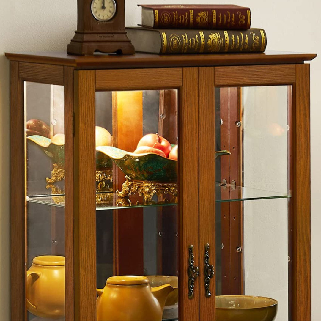 Cenia Lighted Curio Cabinet with Adjustable Shelves and Mirrored Back Panel,not included bulb Alcott Hill® Color: Oak