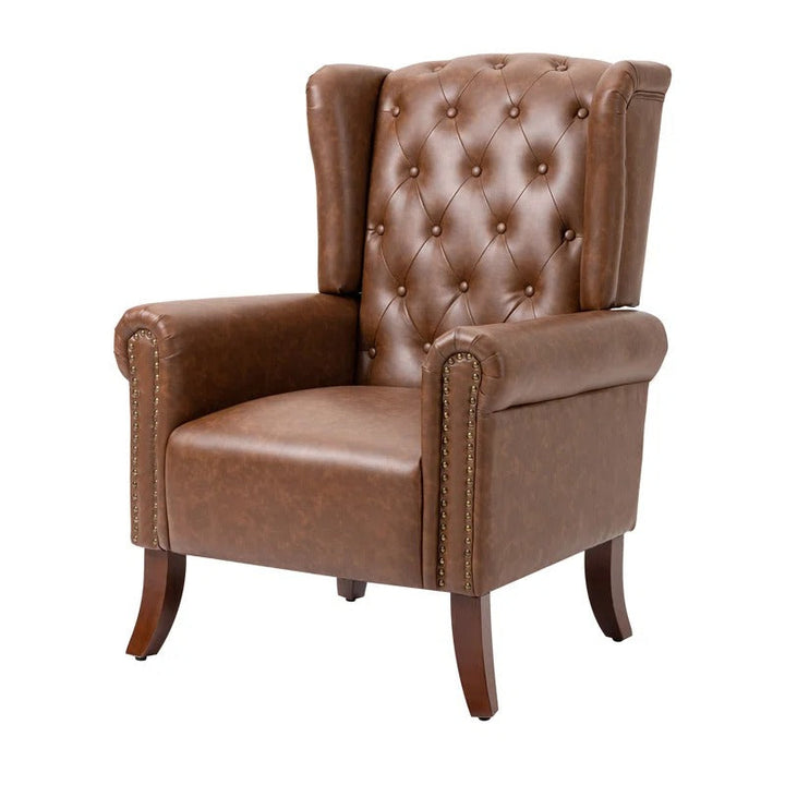 Abdul Ahad Wide Tufted Faux Leather Wingback Chair