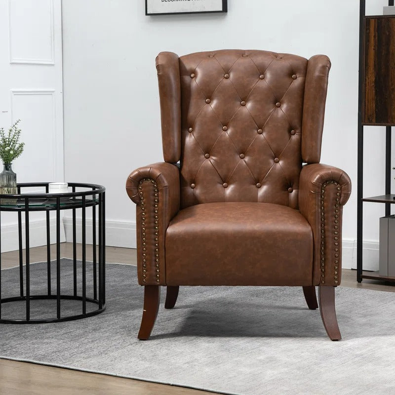 Abdul Ahad Wide Tufted Faux Leather Wingback Chair
