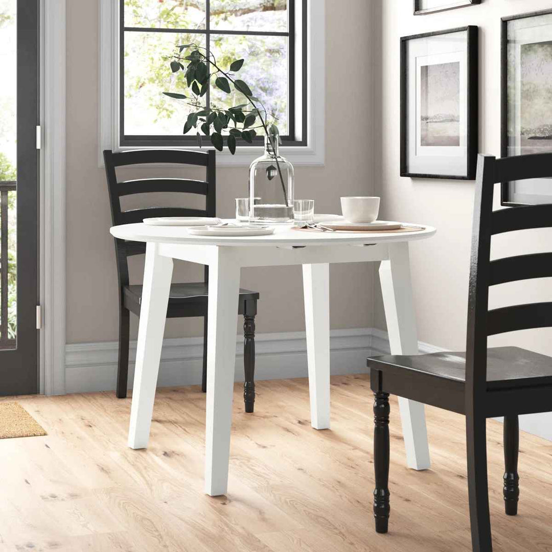 Chaffin Extendable Round Solid Wood Dining Table