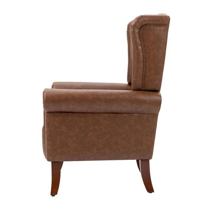 Abdul Ahad Wide Tufted Faux Leather Wingback Chair