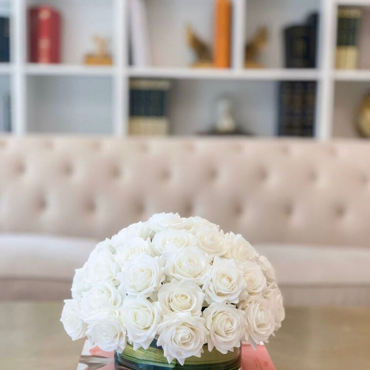 White Real Touch Rose Arrangement In Round Glass Vase