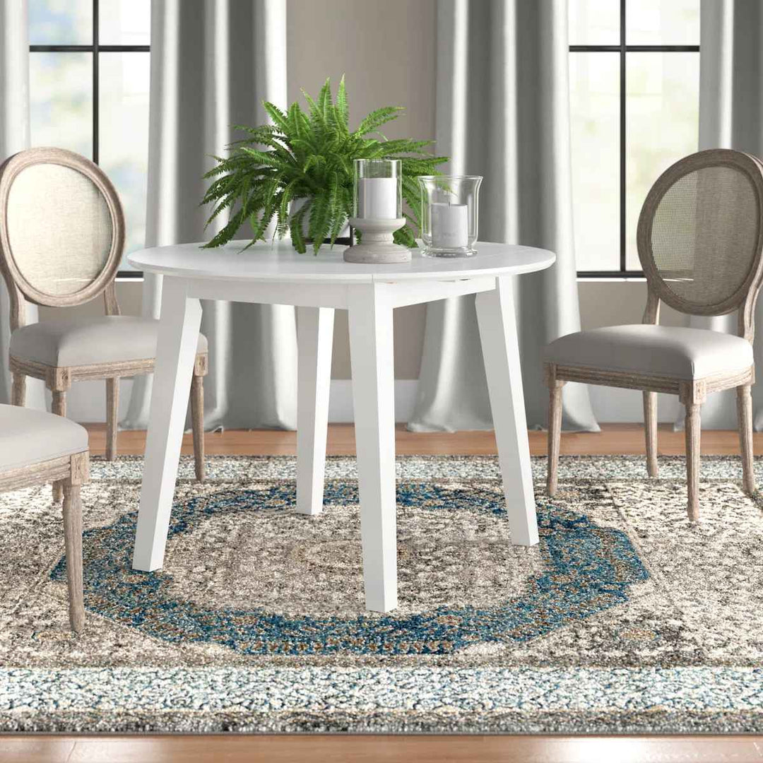 Chaffin Extendable Round Solid Wood Dining Table